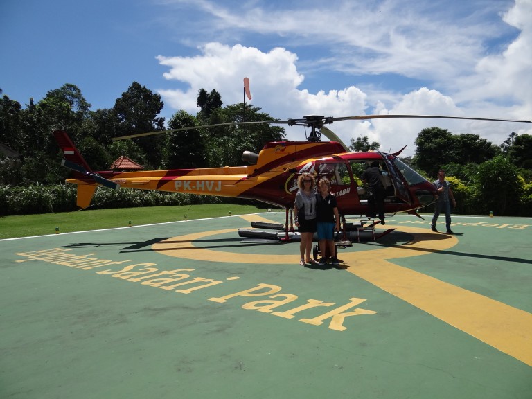 Flying In A Helicopter Over A Volcano Crater